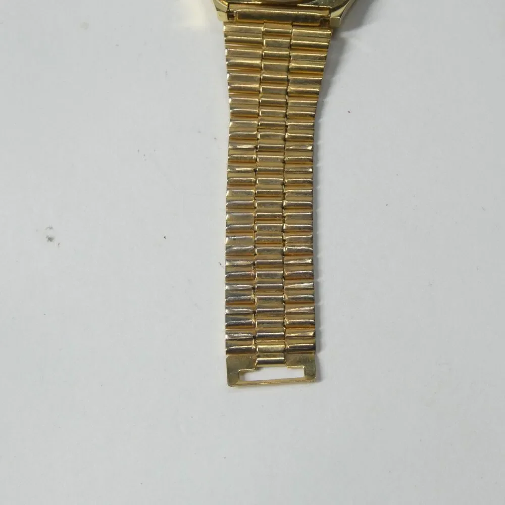 Dynamic LCD Quartz Watch Vintage Goldtone Black Hong Kong Wristwatch